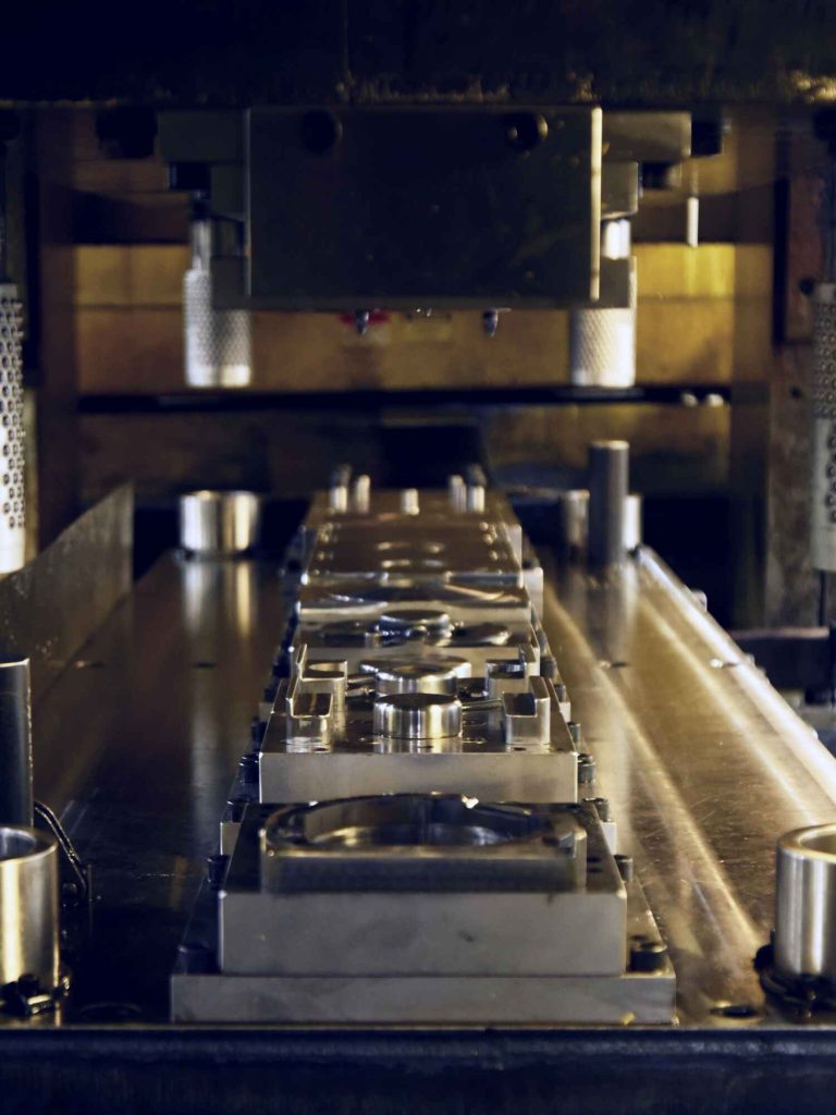 Understanding the Cost and Time Savings of Progressive Die Stamping